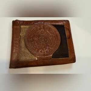 Vintage Brown Leather Wallet with Embossed Design and Two Genuine Pieces of Fur